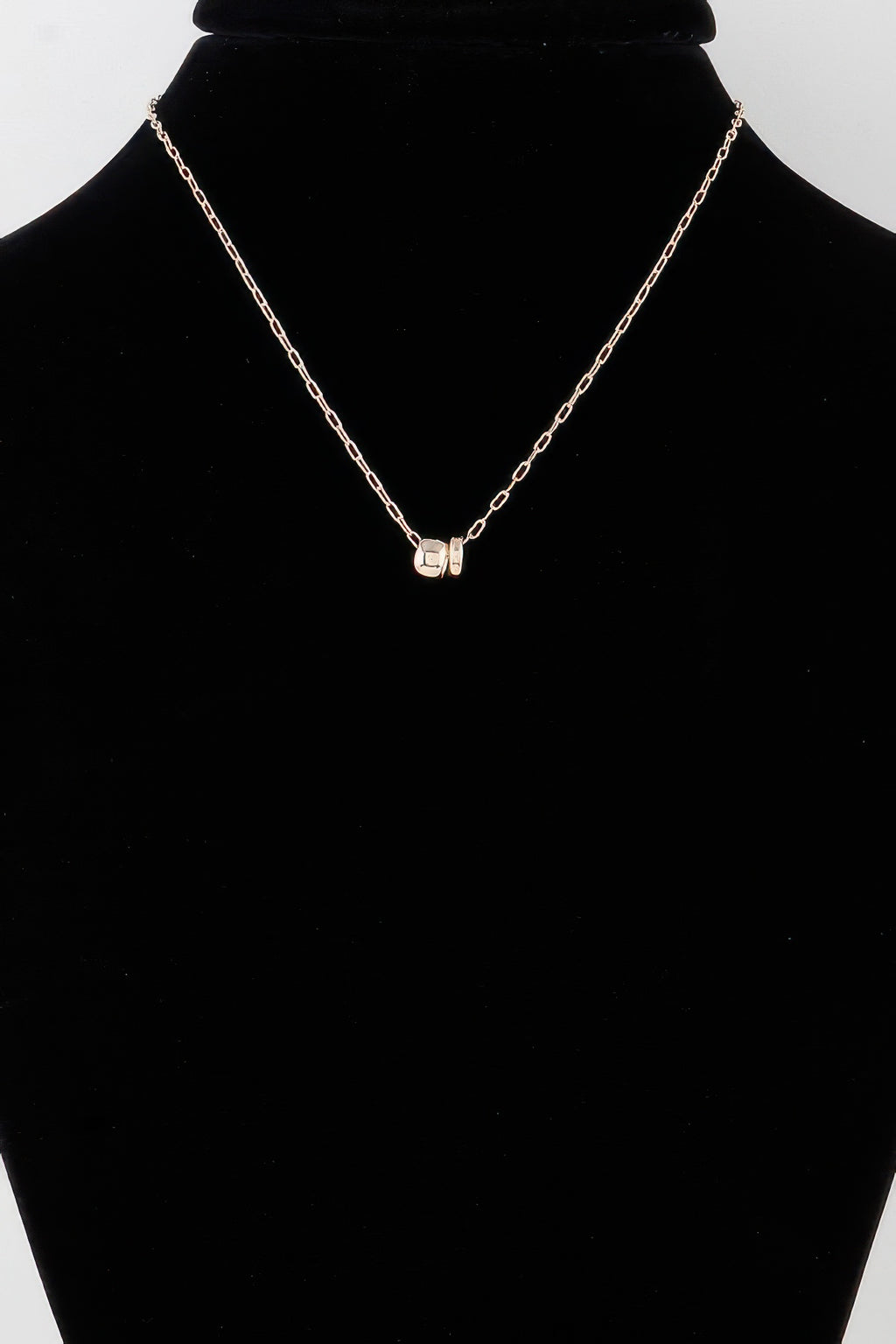 Chain necklace with small heart clasp charm and gold-tone link chain