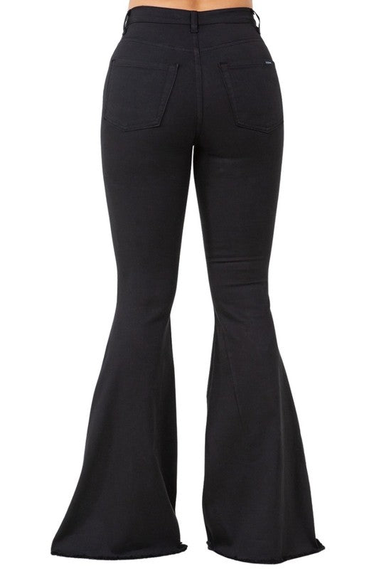 Plain black flared jeans with back pockets and button-zip closure