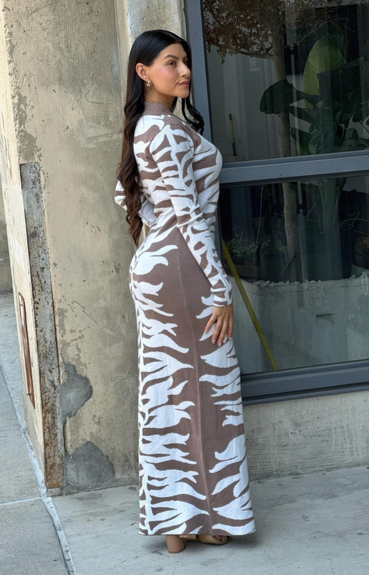 Animal print bodycon maxi sweater dress, long sleeves, side view with zebra stripe pattern