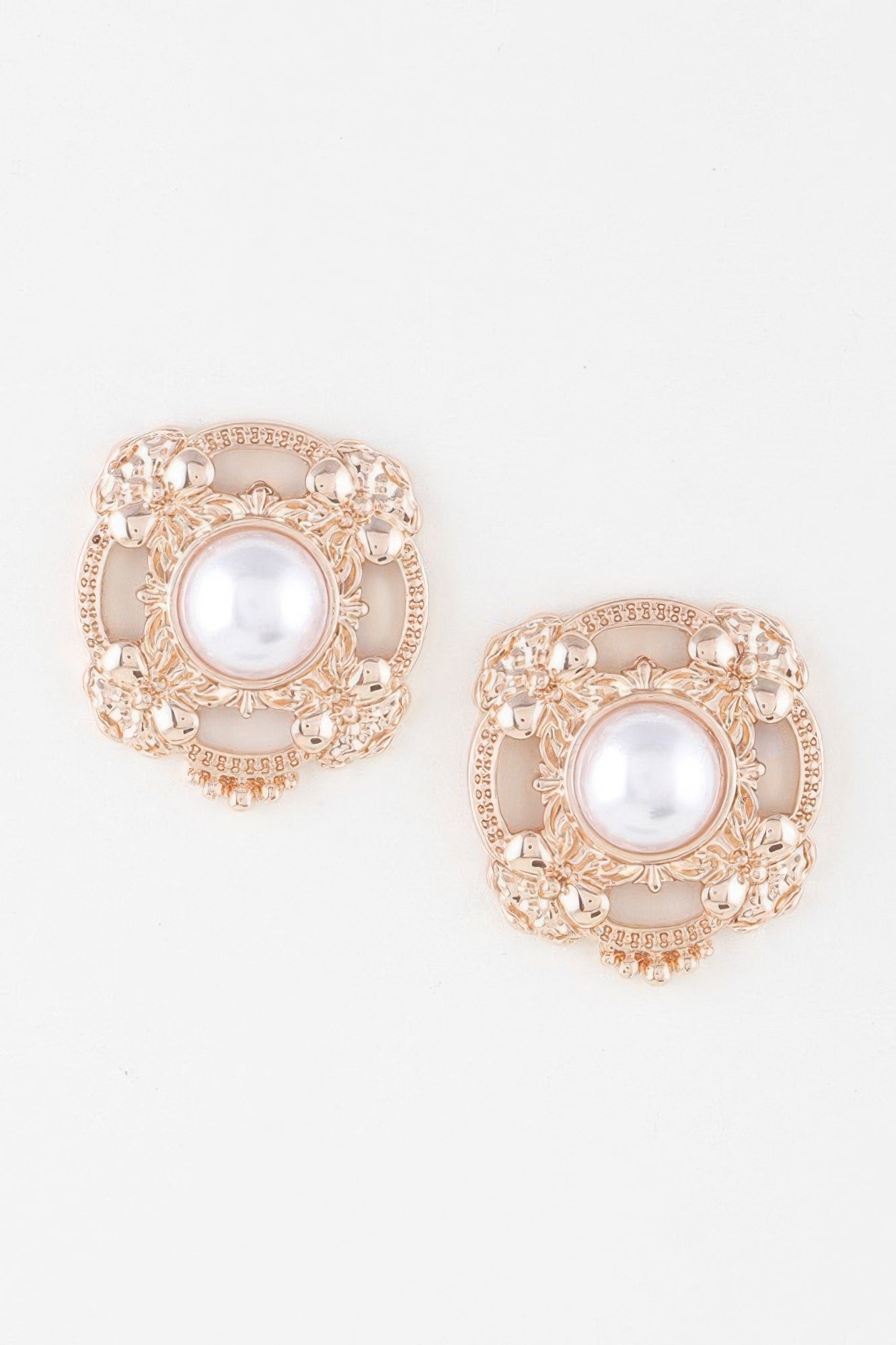 Antique ribbon pearl stud earrings in gold cream, pair with round white pearl centers