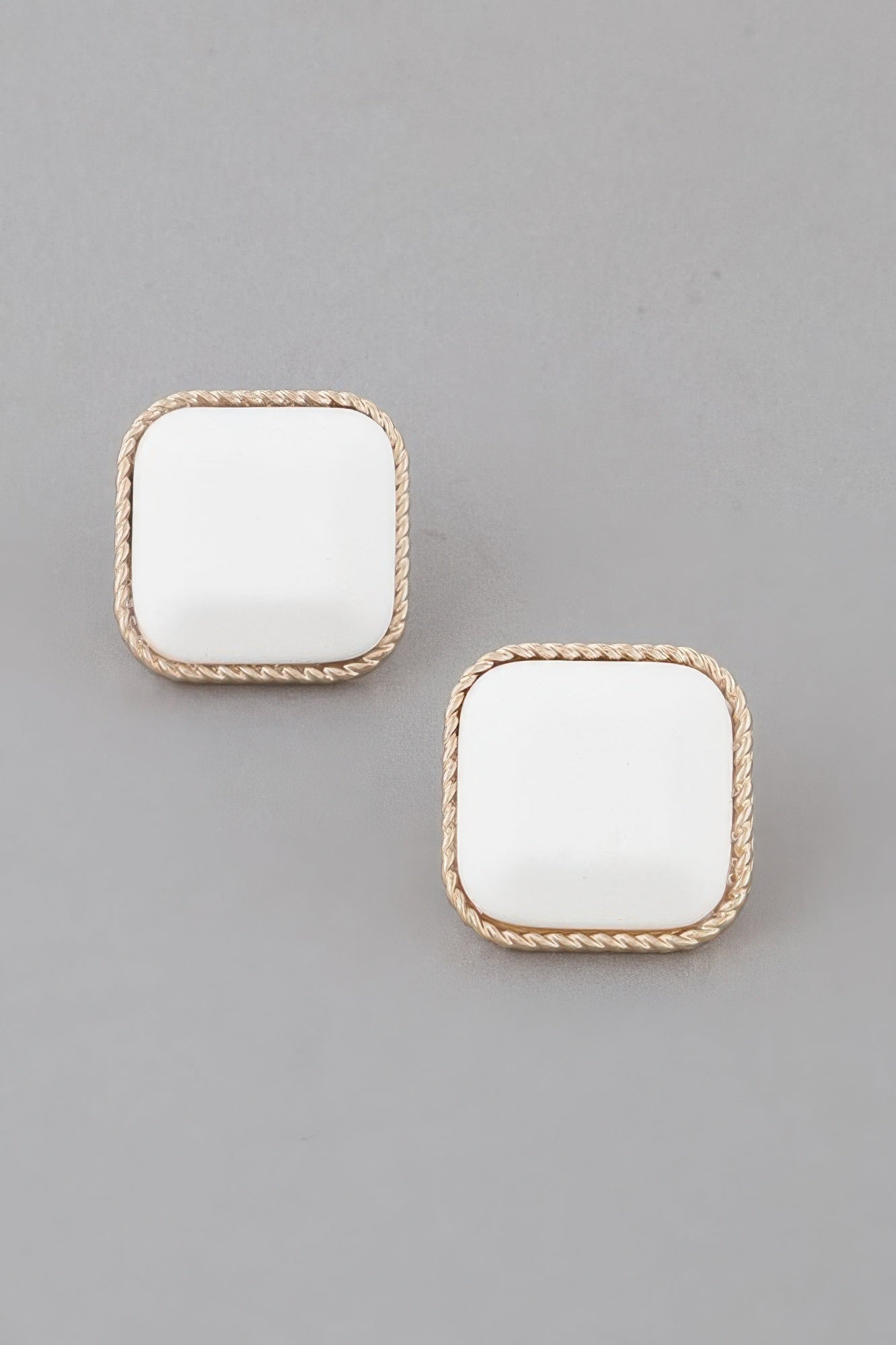 Antique Twisted Cubic Earrings—gold frame with white square stones pair