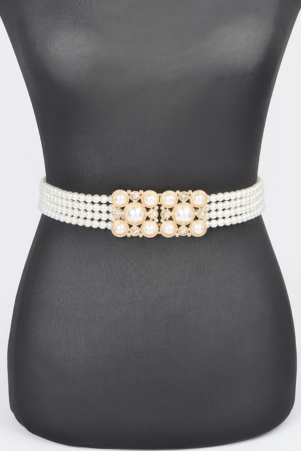 Cream faux pearl elastic belt with gold-toned floral center buckle and rhinestone accents