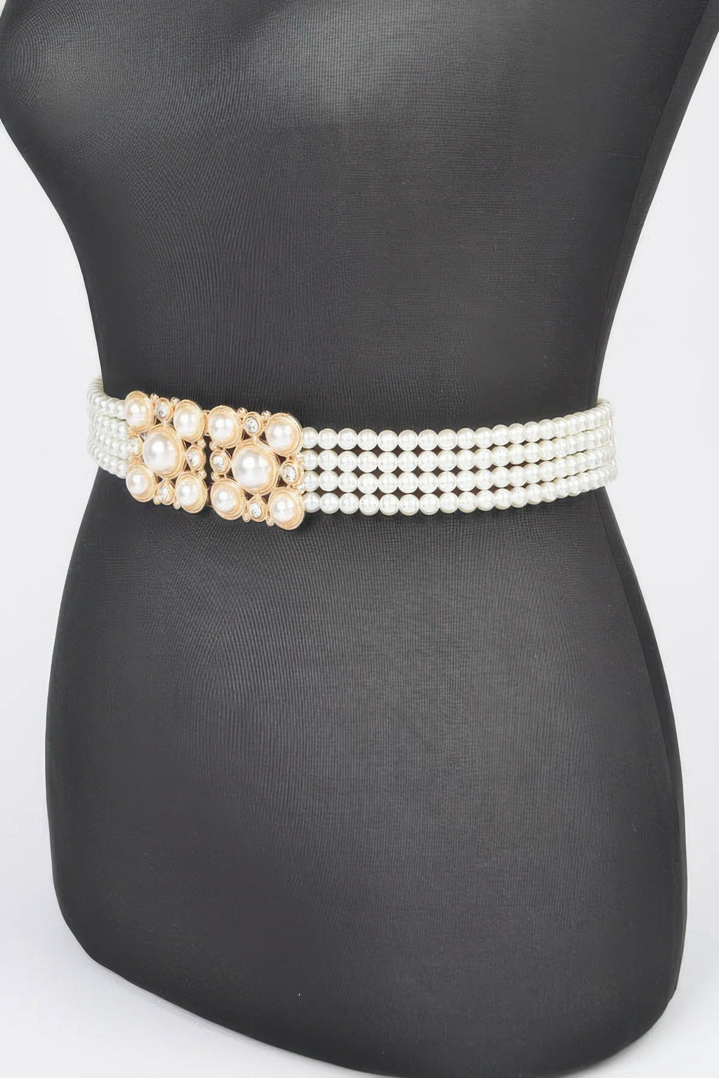 Cream faux pearl elastic belt with gold-toned rectangular center buckle detail