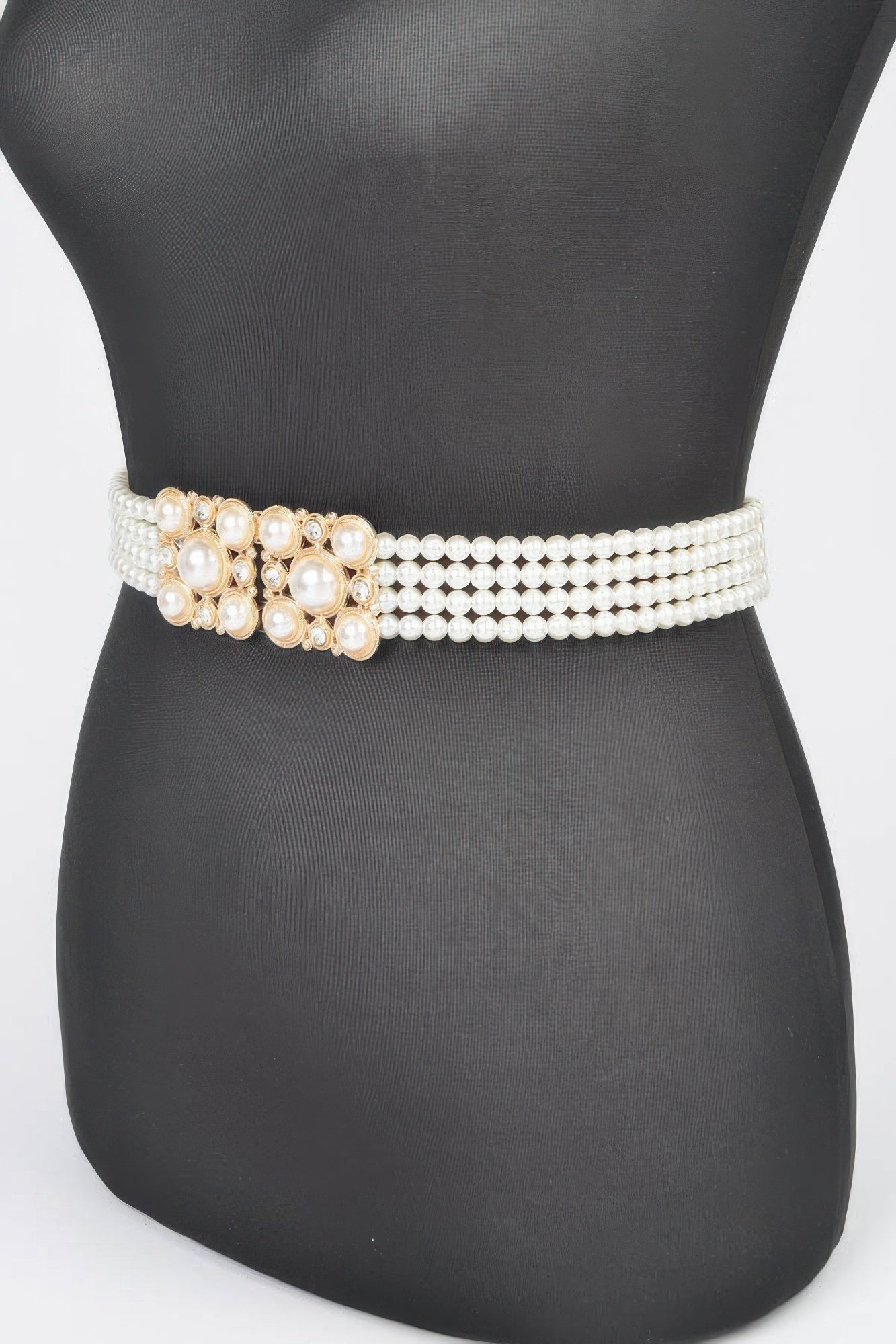 Cream faux pearl elastic belt with gold-toned rectangular center buckle detail