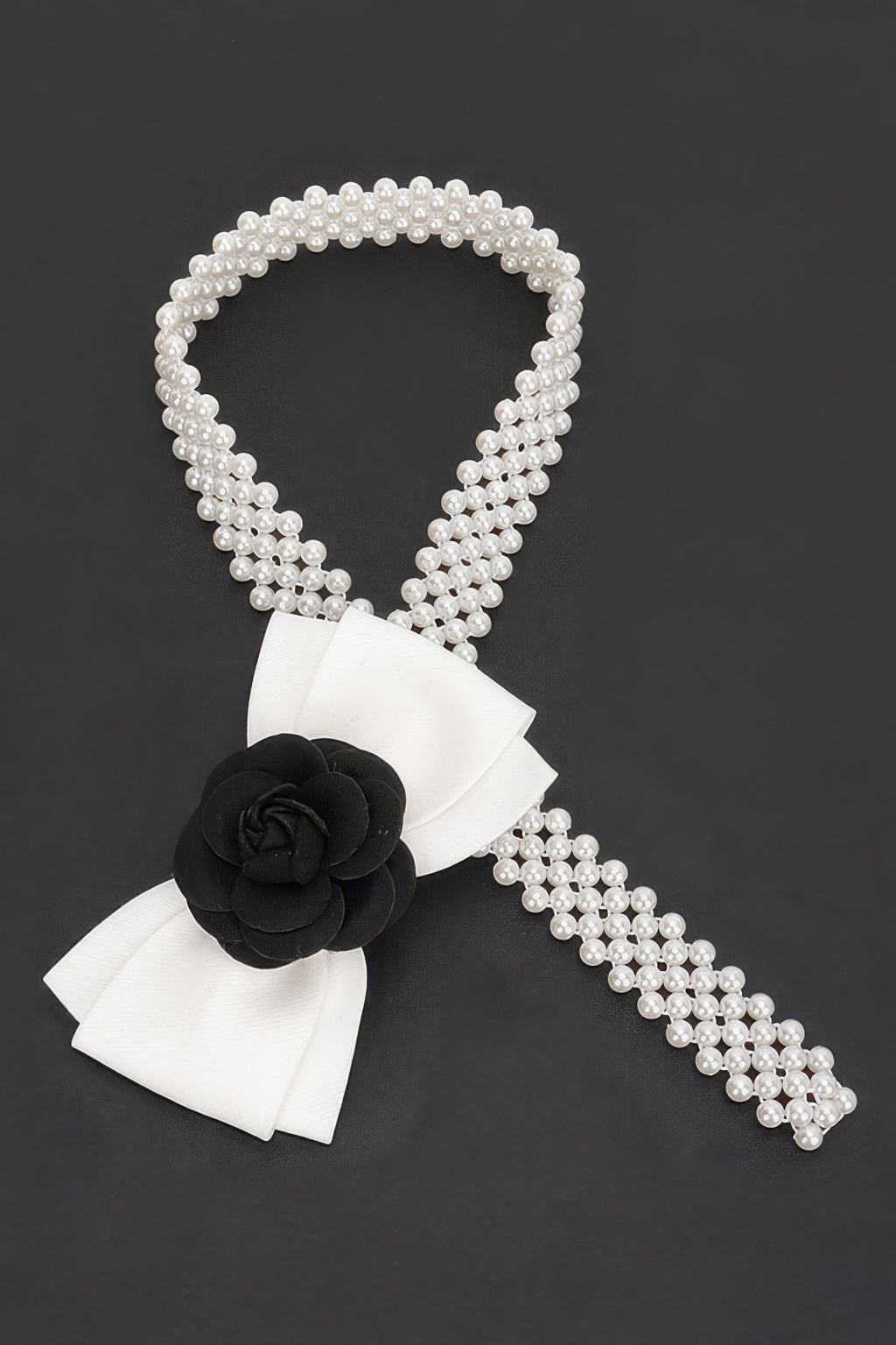 White faux pearl stretch belt with black flower ribbon bow