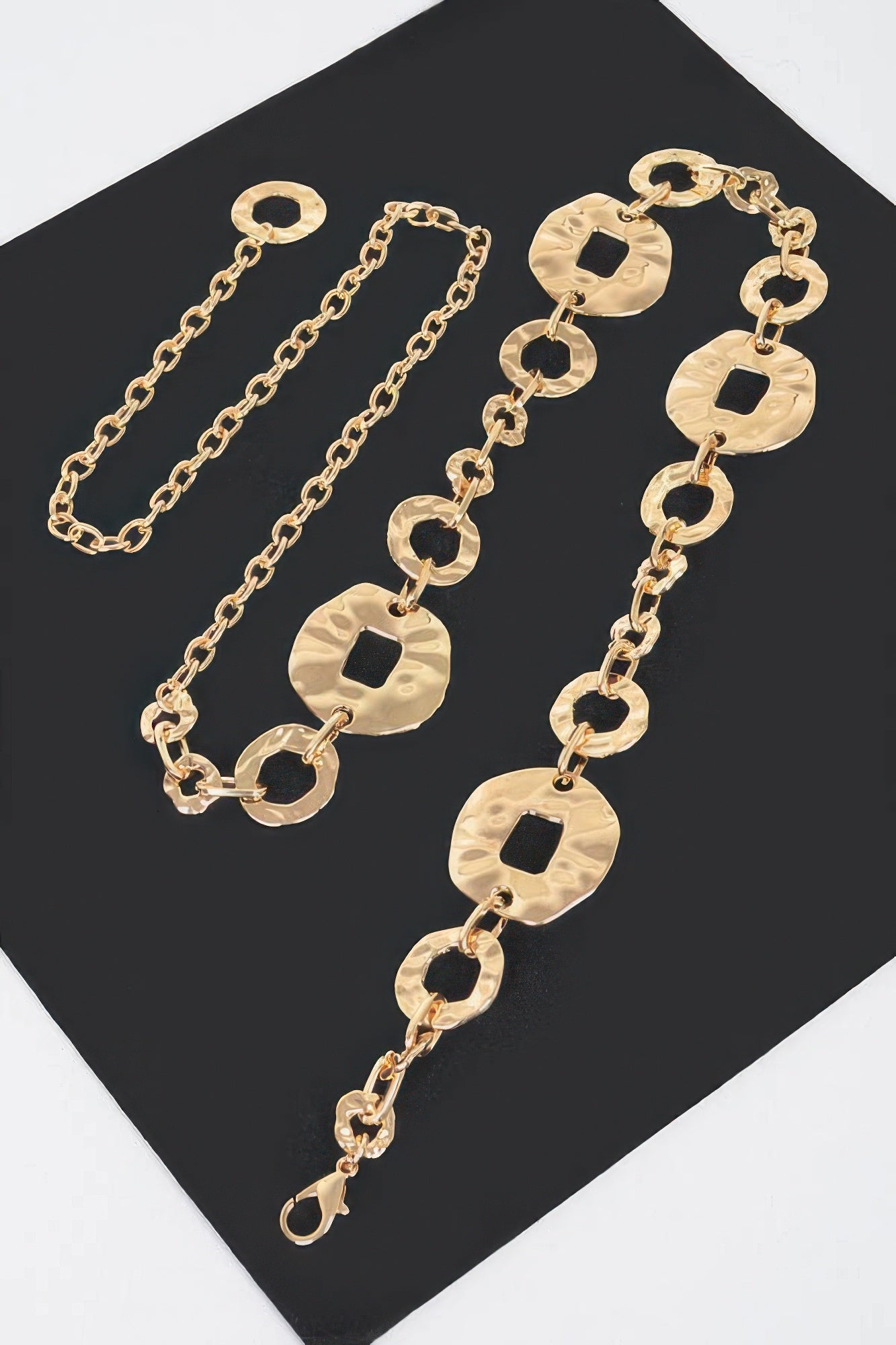 Hammered metal chain belt, gold-toned with hammered oval links and black insets