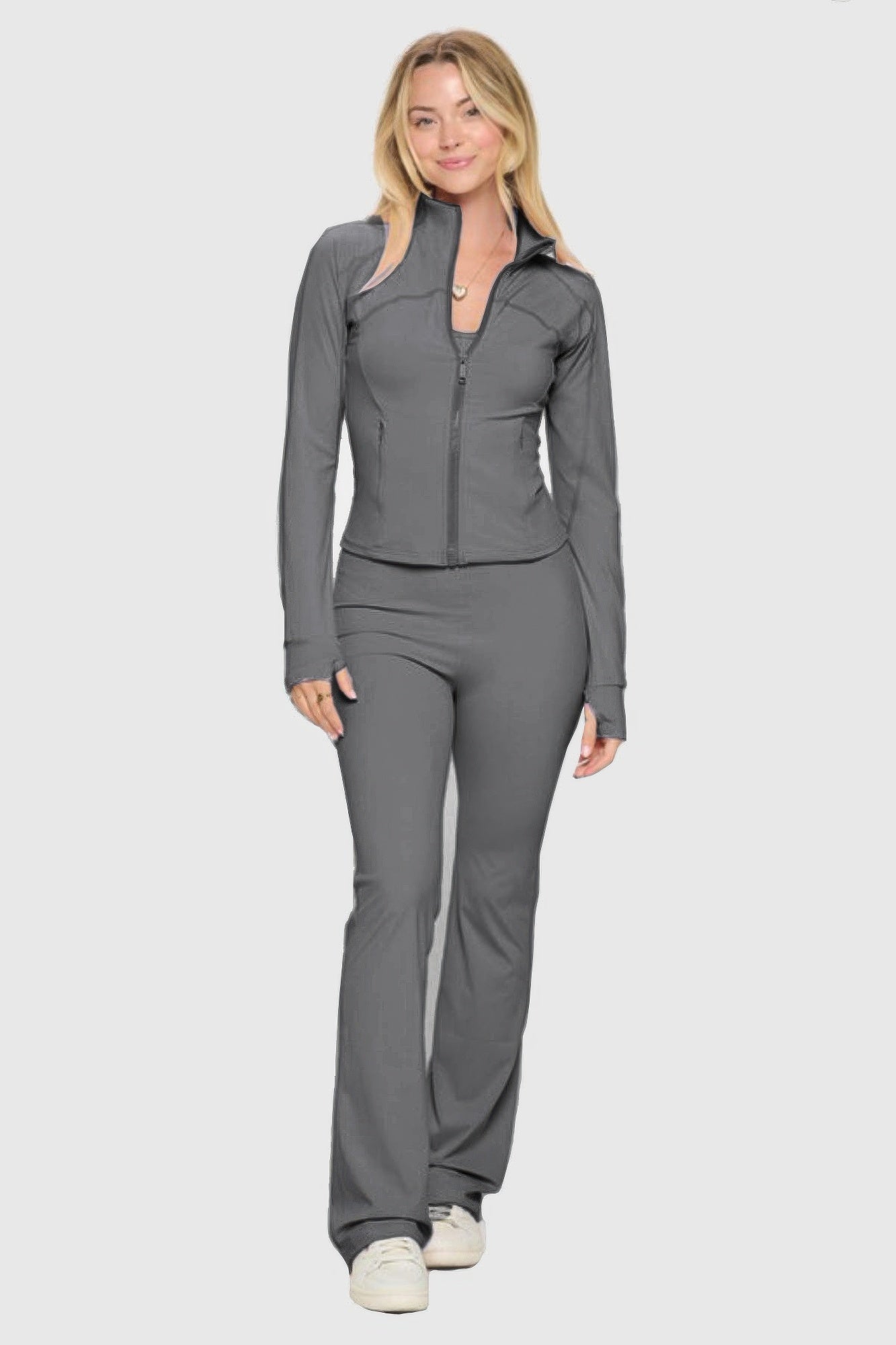 Grey yoga jacket and jumpsuit set with full-zip front, matching grey pants
