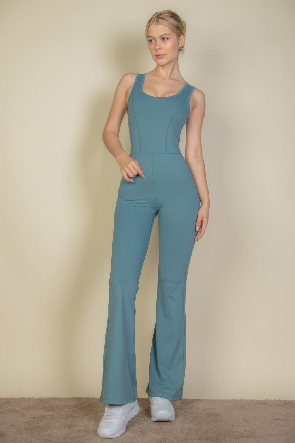 Solid flare-leg sports jumpsuit in slate green, sleeveless square neckline