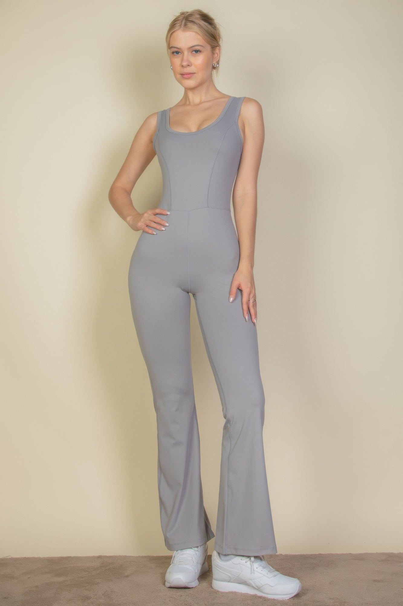 Solid flare-leg sports jumpsuit in cement gray, sleeveless scoop neck
