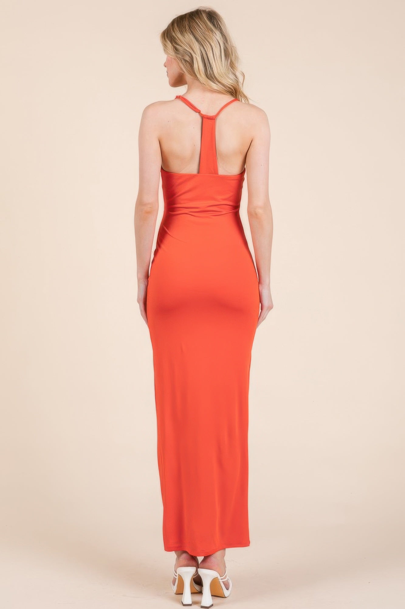 Back view: Good Red double-layer maxi dress with open-back straps and ruched waist.
