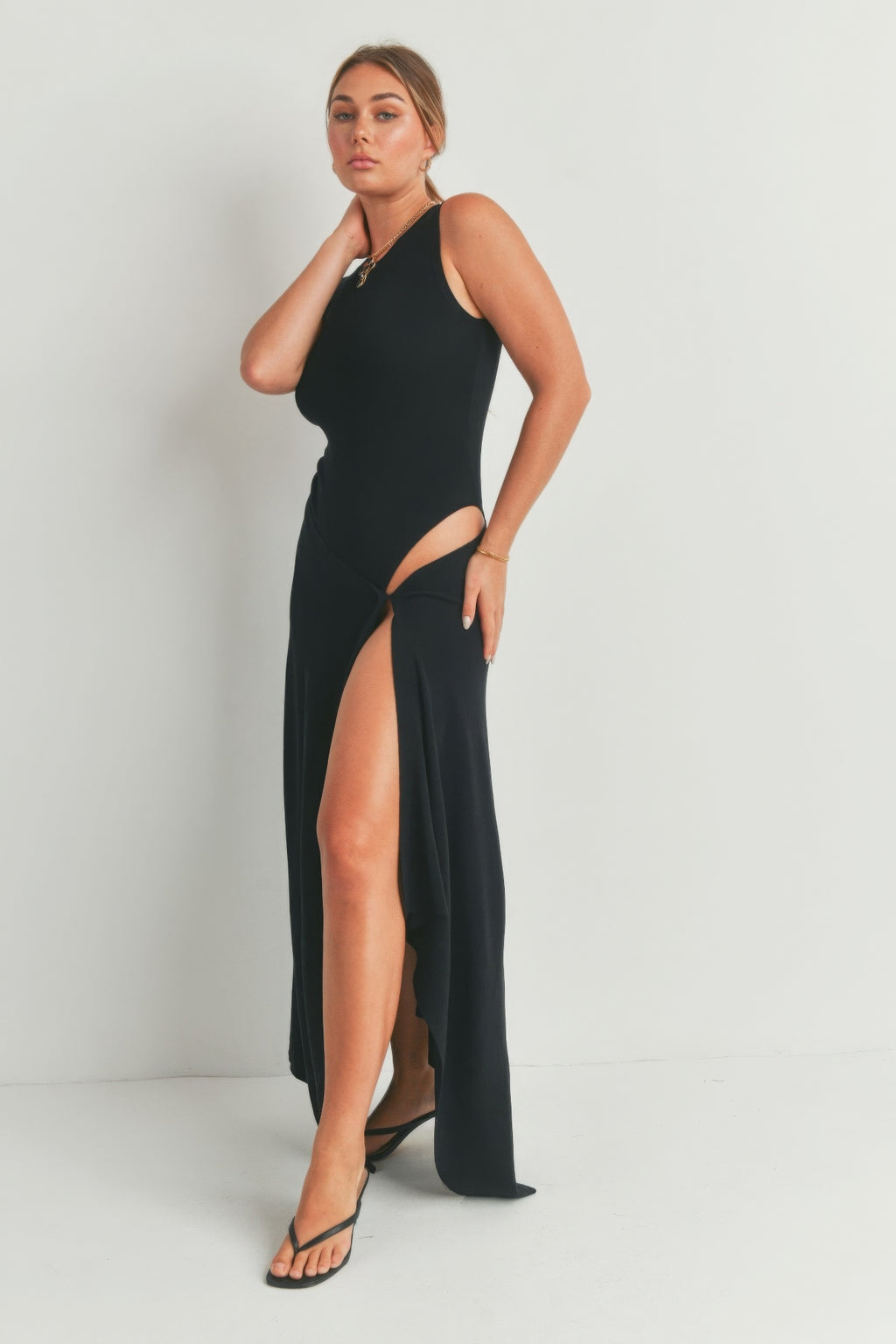 Black sleeveless maxi dress with thigh-high slit and sleeveless bodice