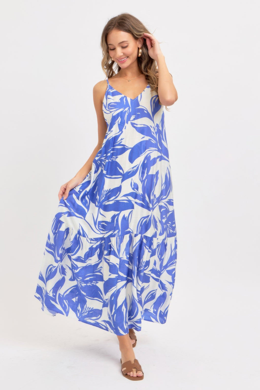Blue floral maxi sundress with tiered skirt and thin spaghetti straps