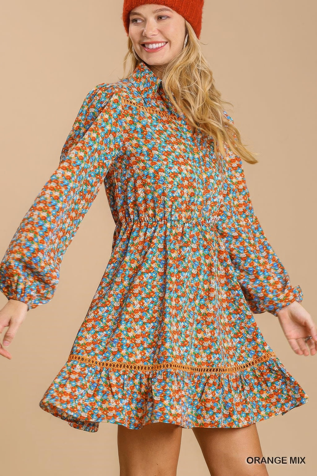 Orange floral collared button-front mini dress with long sleeves and tiered hem
