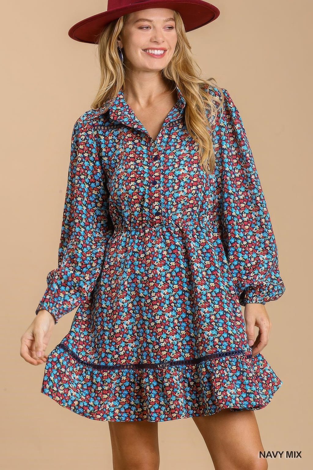 Navy floral collared button-front dress with long puff sleeves and tiered hem