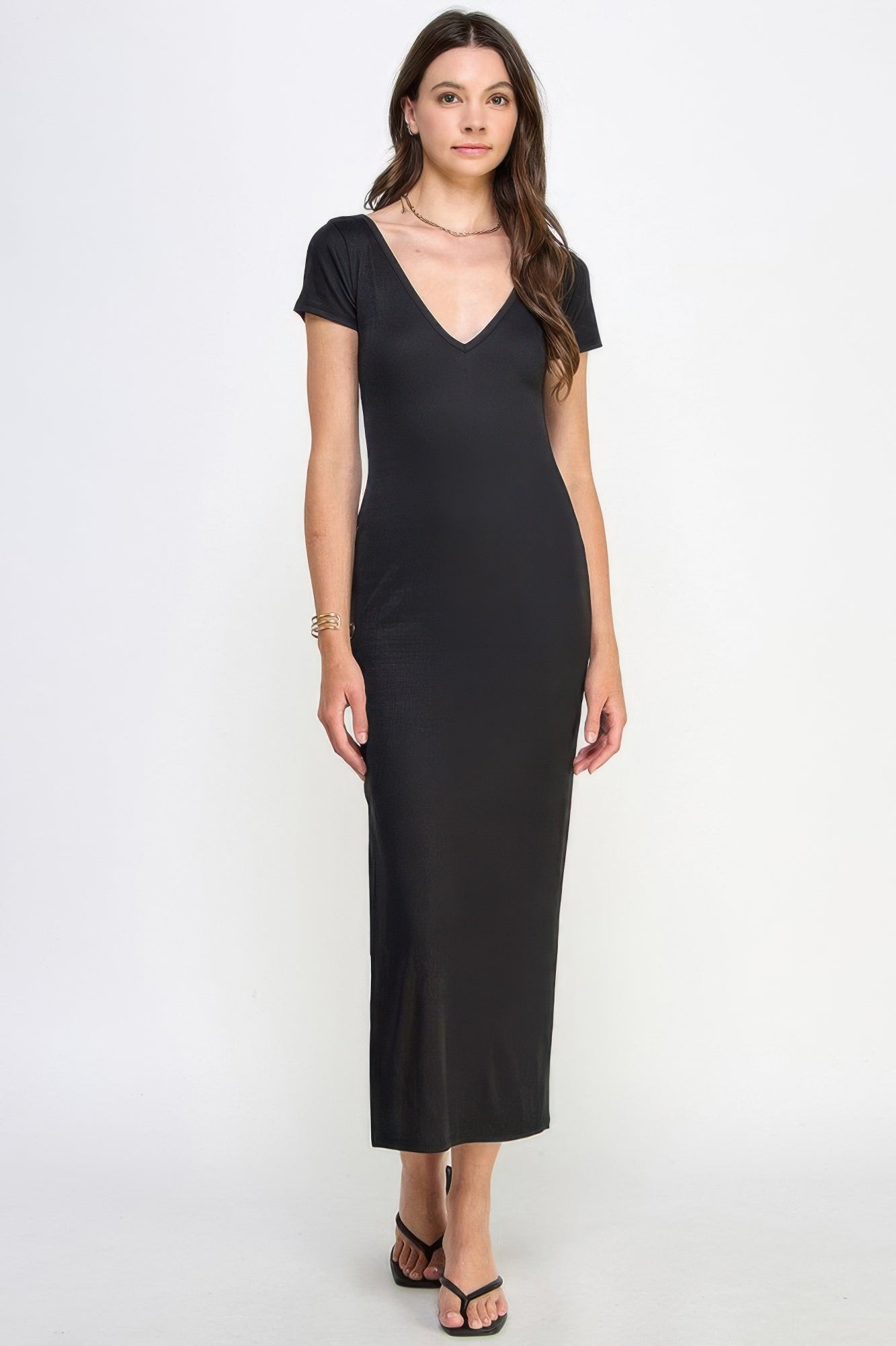Black ribbed maxi dress with double V-neck, short sleeves, fitted silhouette