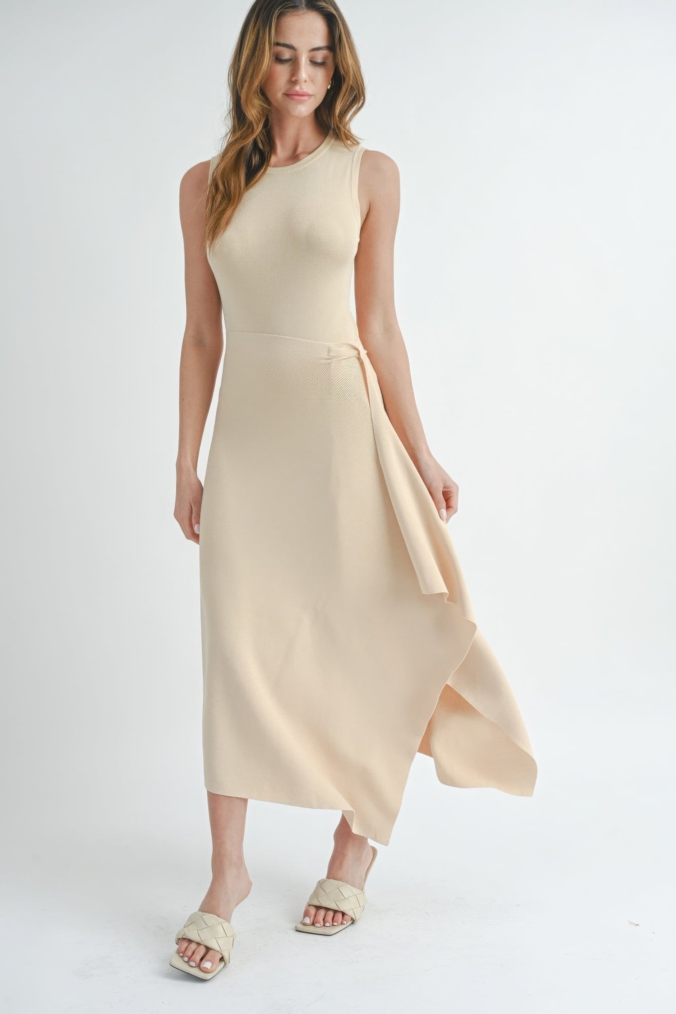 Natural beige sleeveless maxi dress with side tie waist and side slit hem