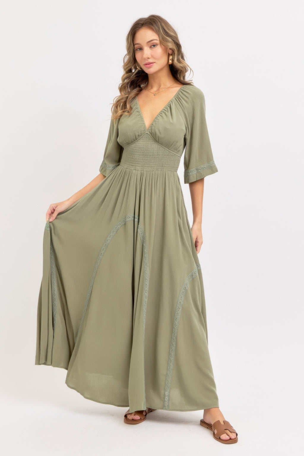Romantic flowy maxi dress in dusty sage with gathered waist and tiered skirt