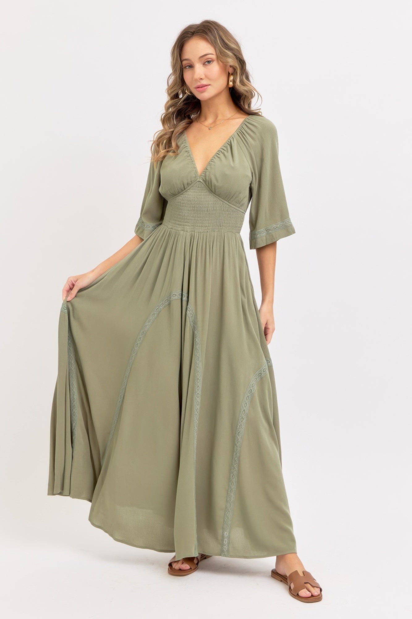 Romantic flowy maxi dress in dusty sage with gathered waist and tiered skirt
