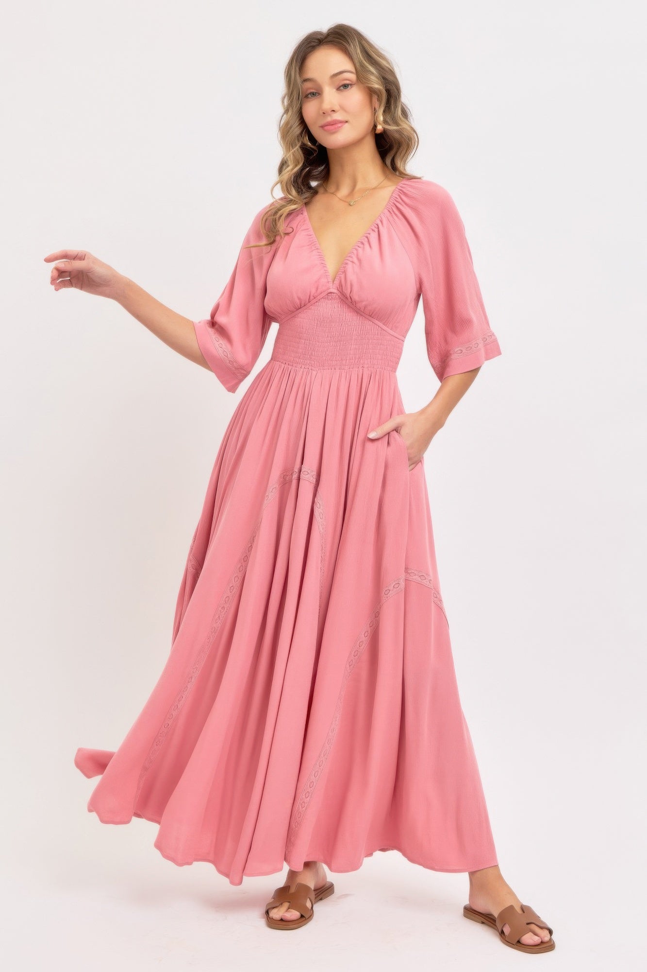 Romantic flowy maxi dress in pink rose with V-neck and three-quarter sleeves