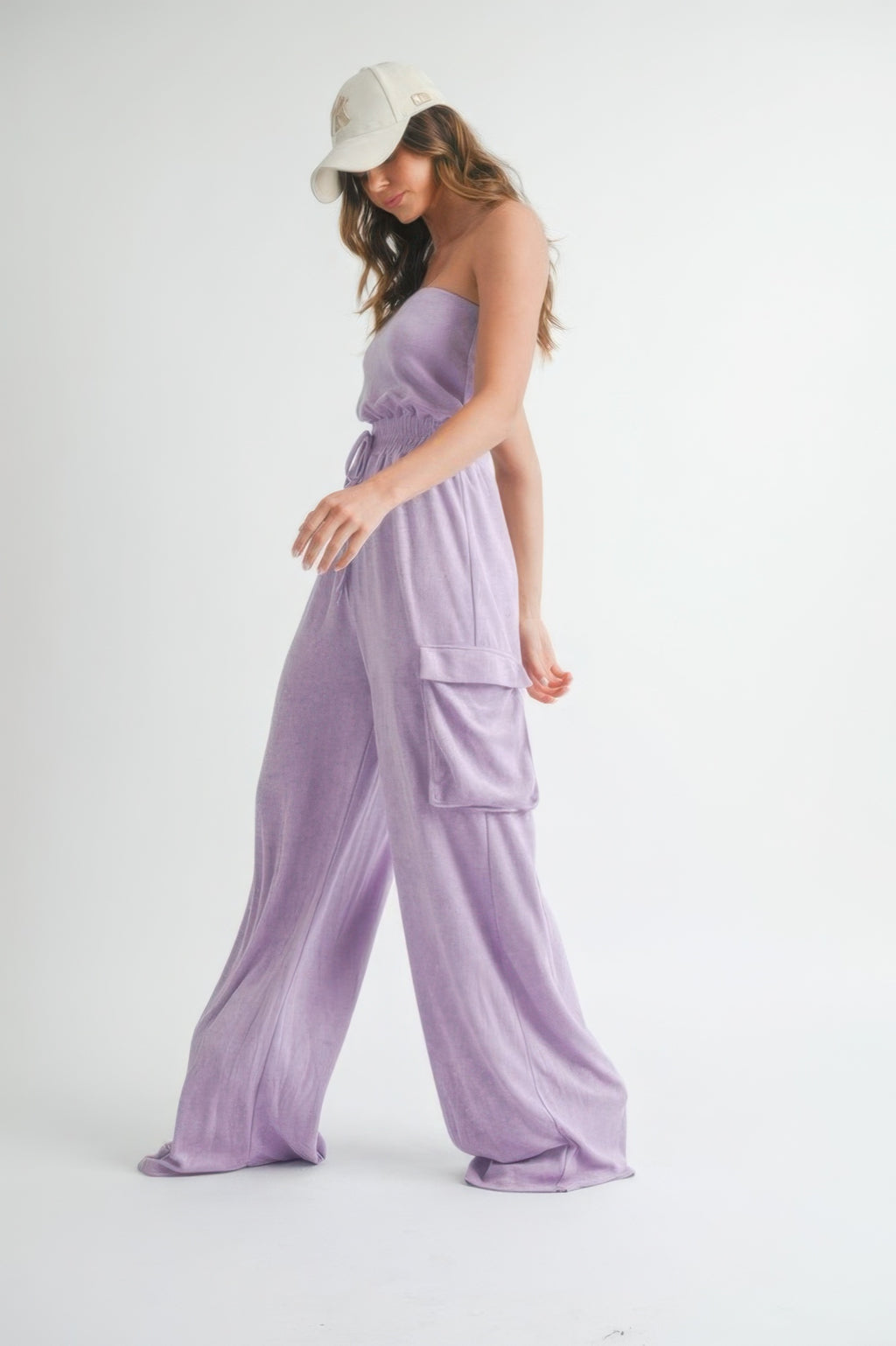 Lavender tube top jumpsuit with drawstring waist and visible cargo pocket on leg