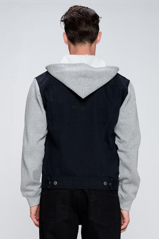 Back view: black denim jacket with gray fleece hood and snap button details