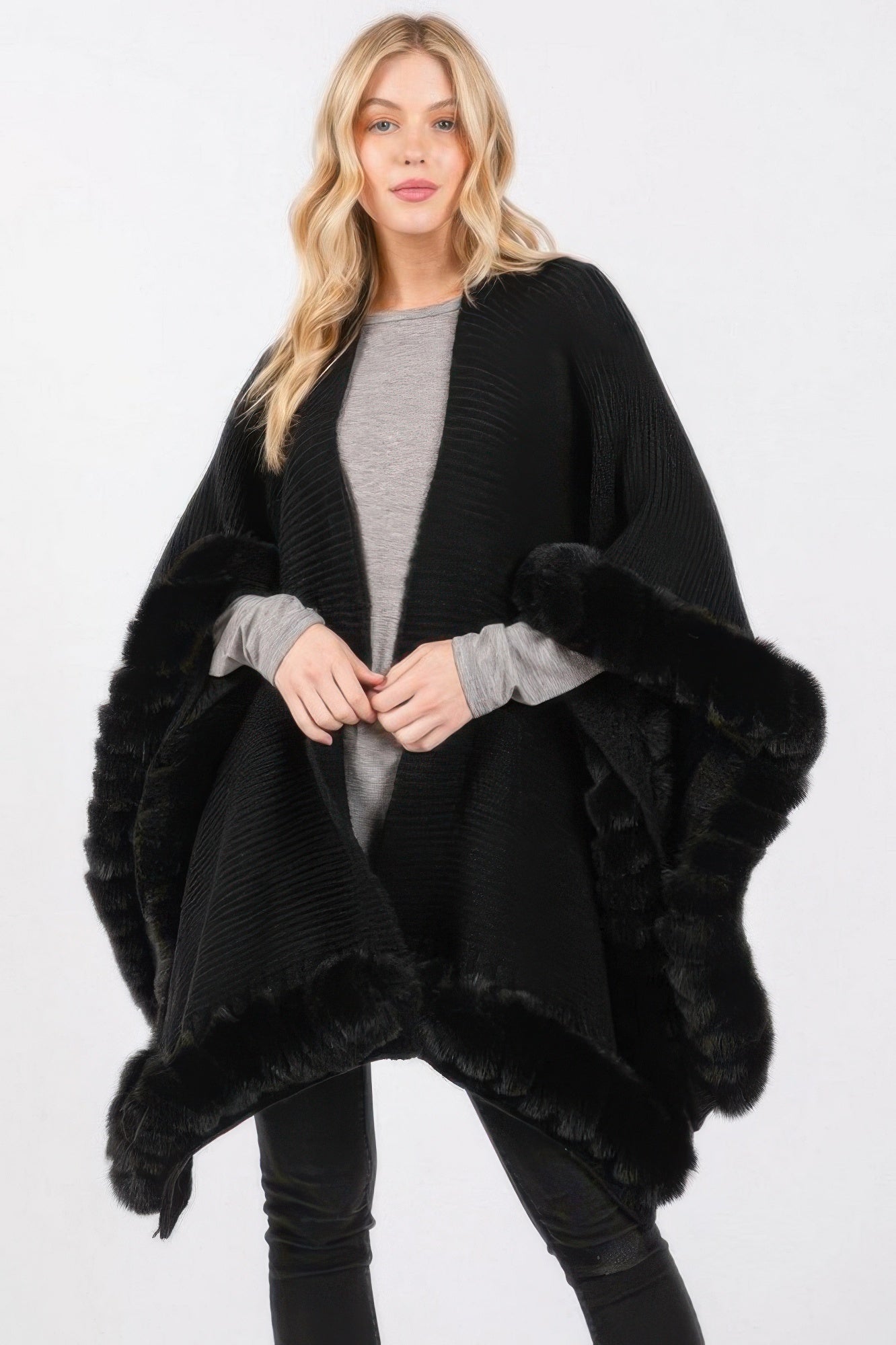 Black faux fur trim cape with wide sleeves and plush fur edging