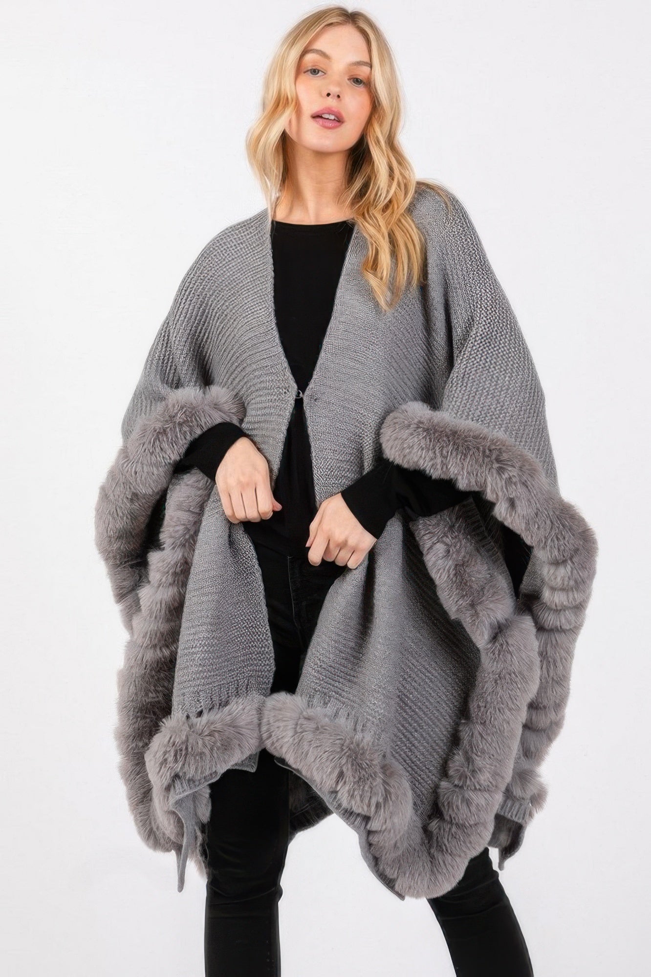 Gray faux fur trim cape with front closure and oversized fur cuffs