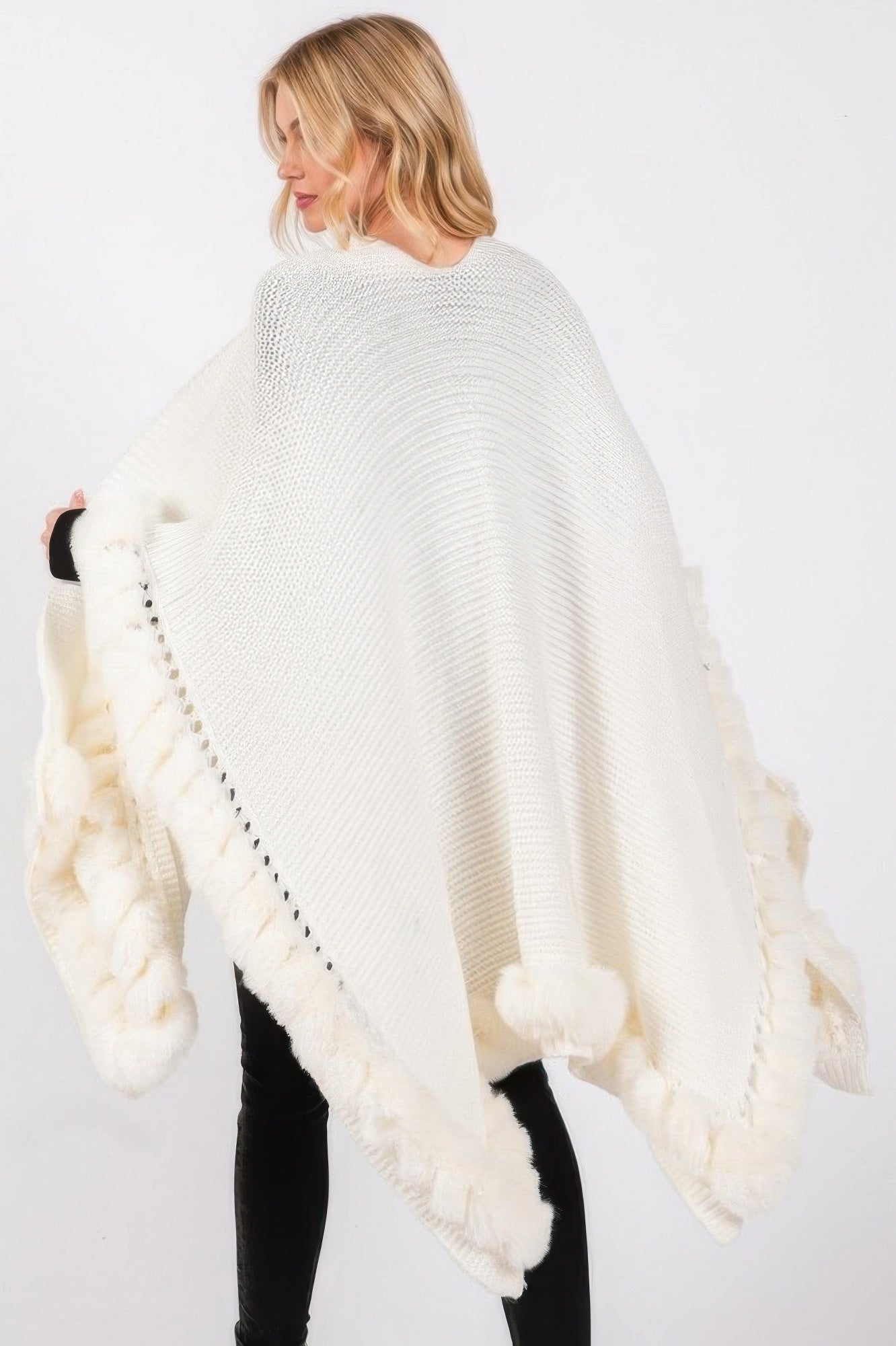 Ivory faux fur trim cape, back view with fur-edged hem and sleeves