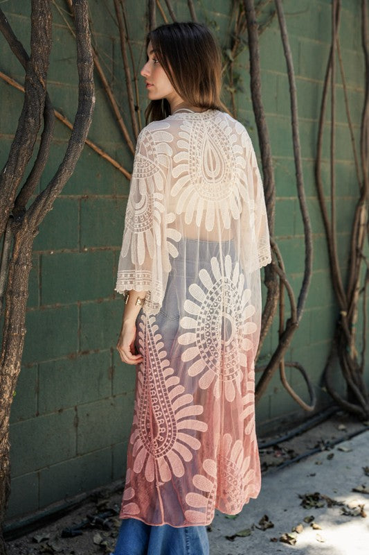 Back view: rose-and-white ombre lace kimono with wide sleeves and open front, one size