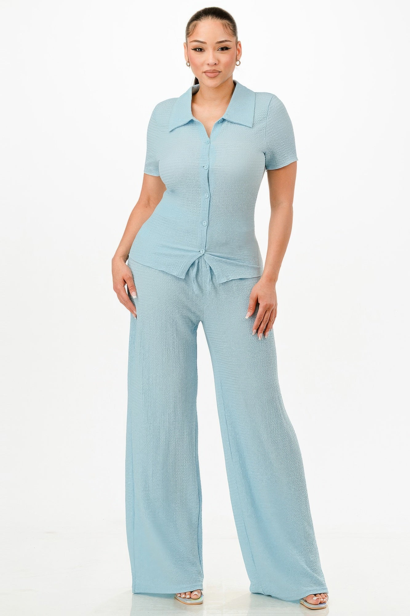 Blue textured polo top and wide-leg pants set, front view with knotted hem