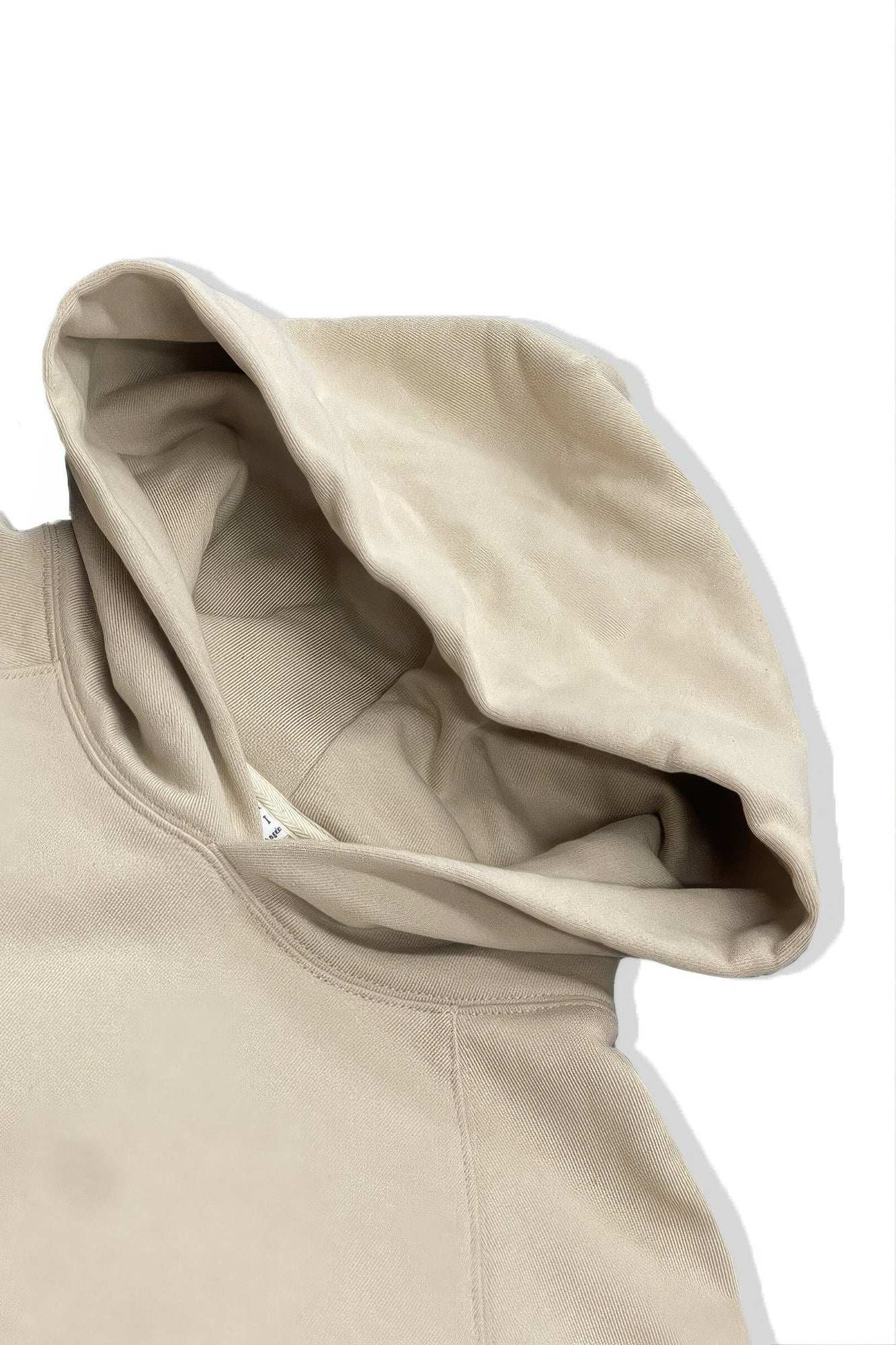 Oatmeal hoodie with interior hood lining visible