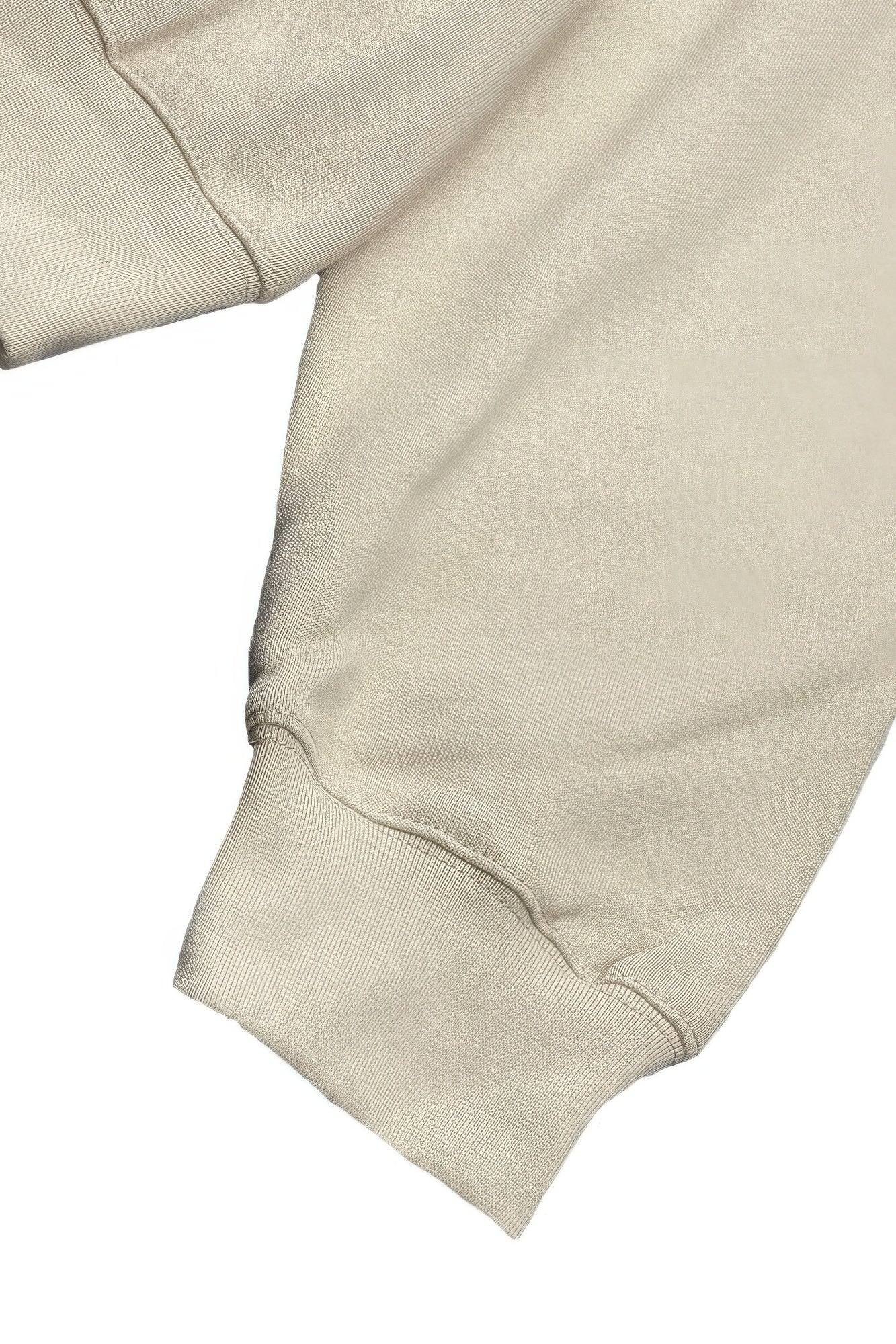 Oatmeal jogger cuff and hem seam detail