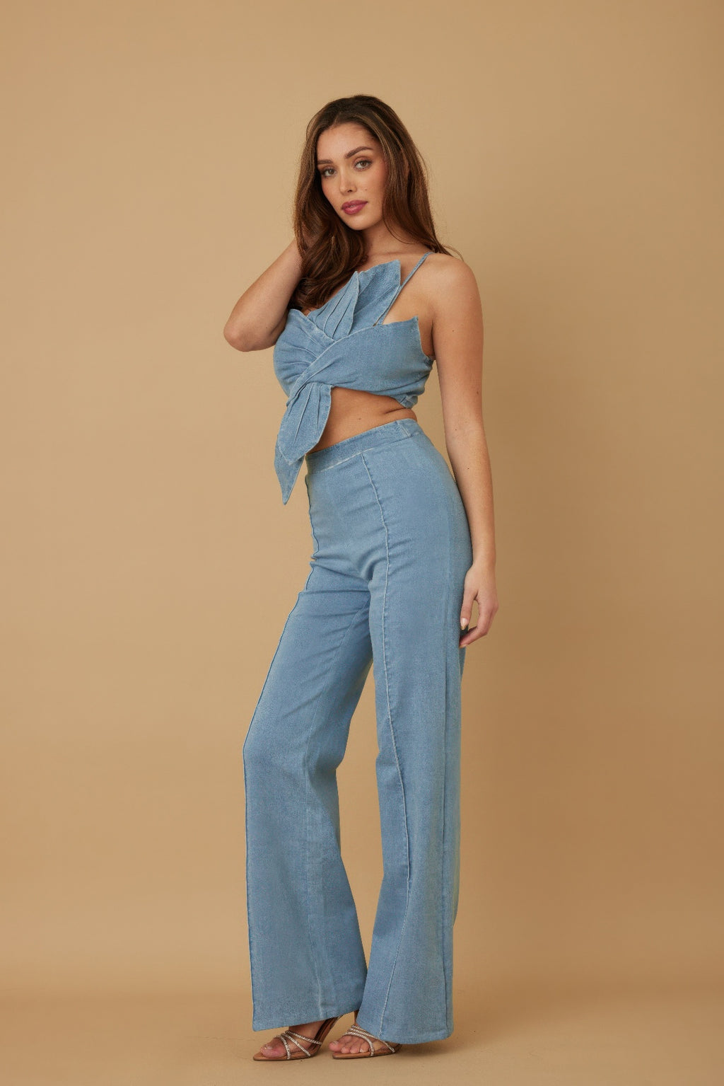 Light denim blue set with off-shoulder wrap flower detail and wide-leg straight pants