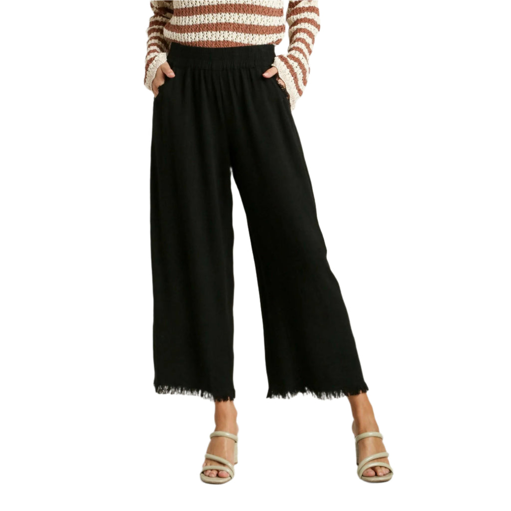 Black linen blend wide-leg pants with elastic waistband and frayed cropped hem