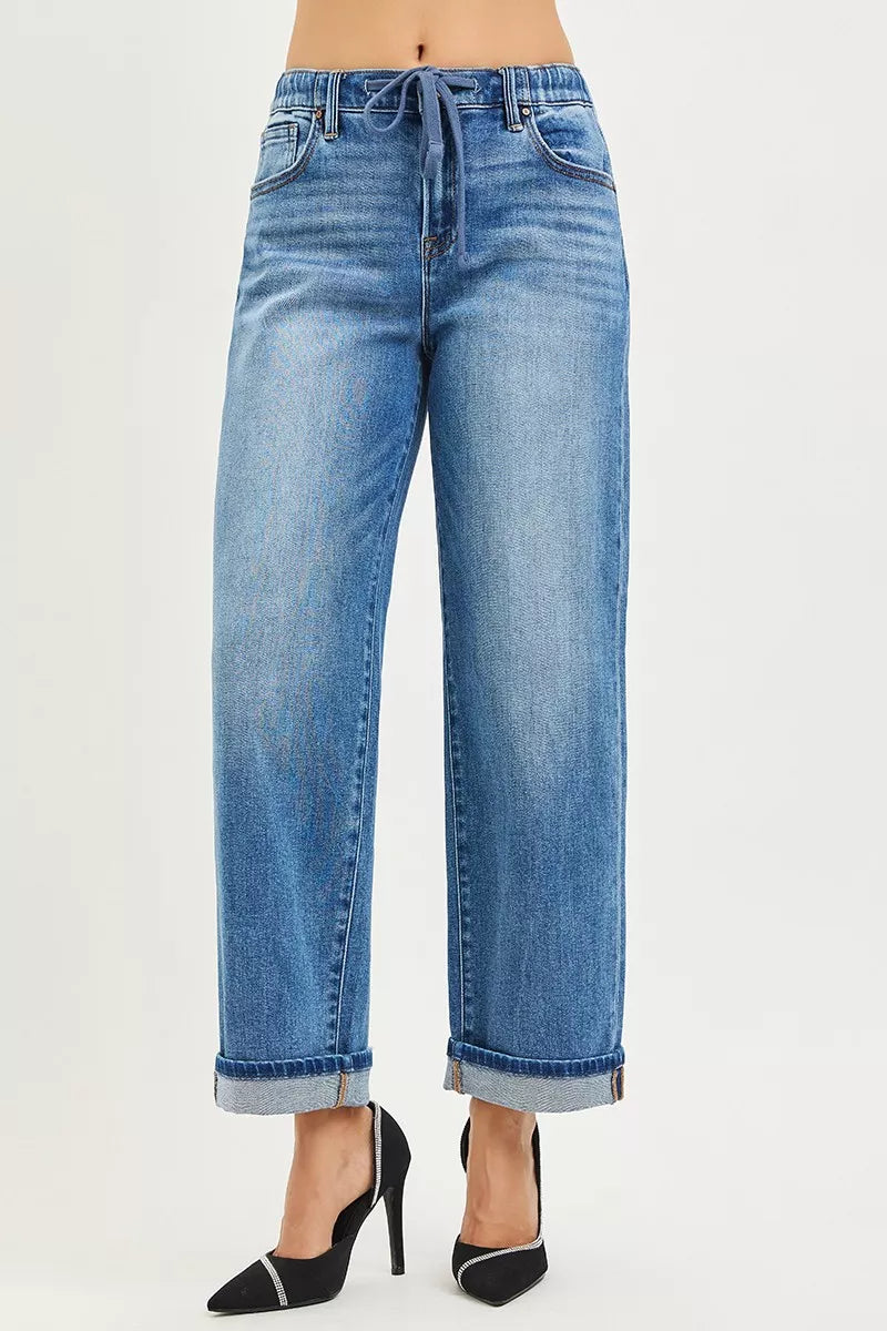 Back close-up blue cuffed boyfriend jeans with drawstring waist and belt loops