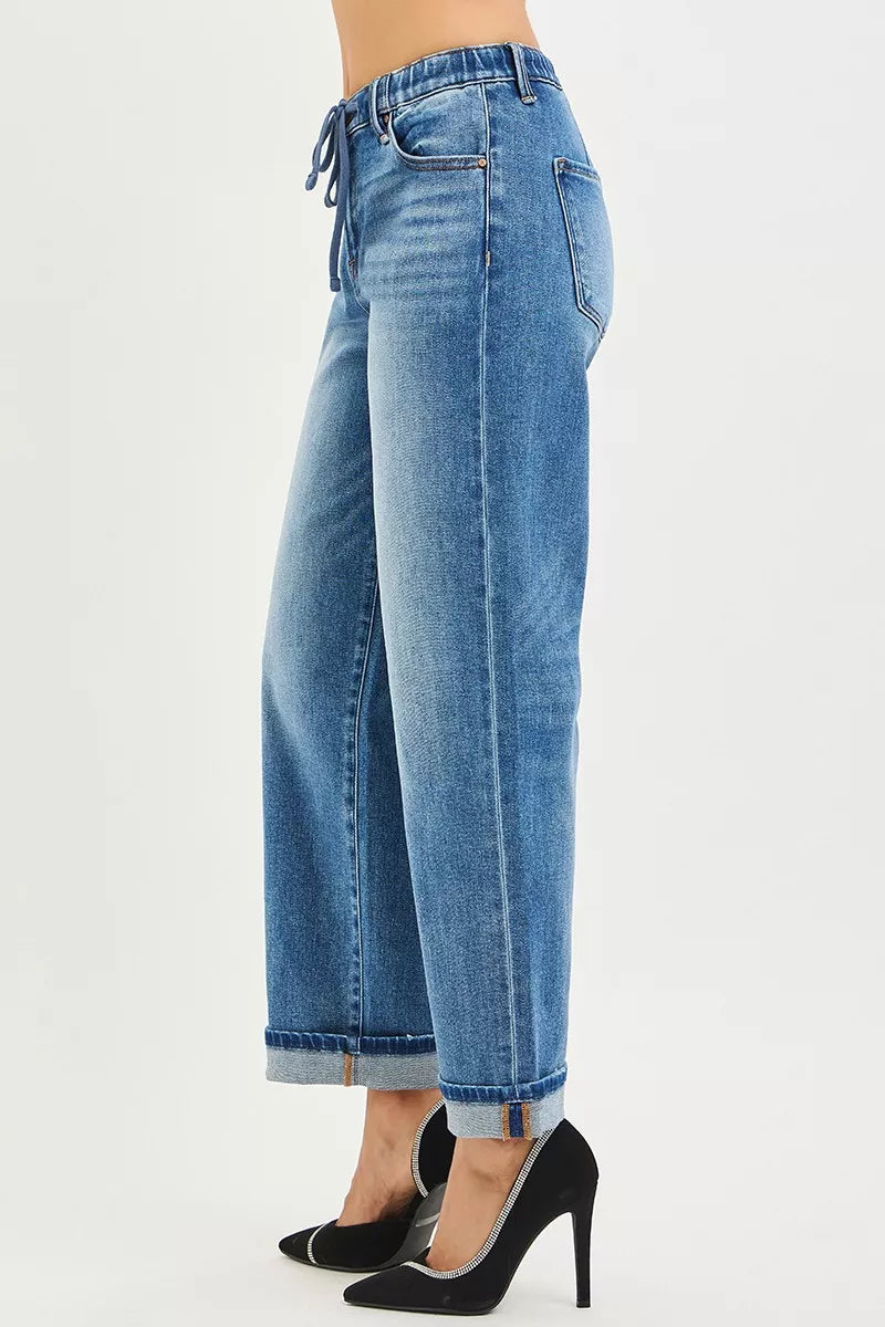 Back view blue cuffed boyfriend jeans with belt loops and patch pockets