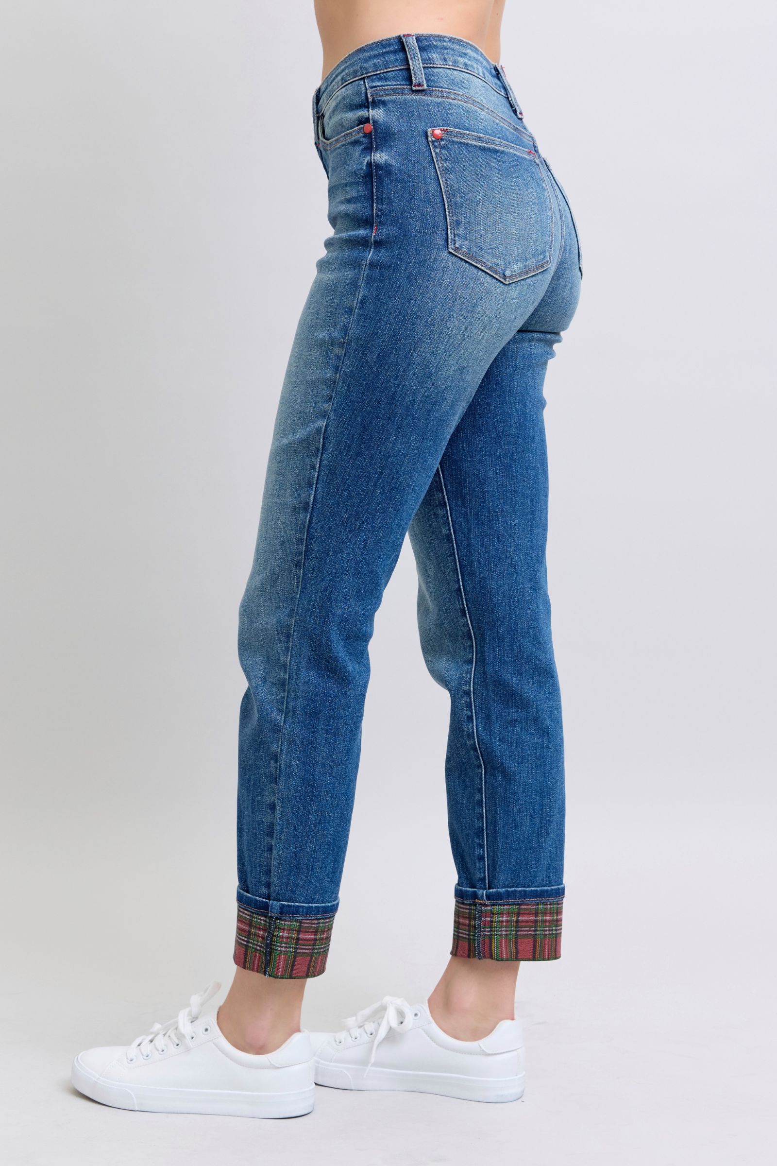 Back view: medium wash Judy Blue jeans with plaid cuff hem and back pockets