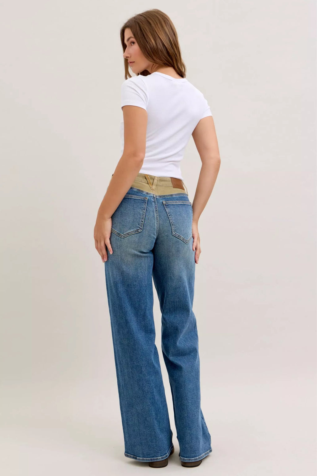 Judy Blue medium blue straight jeans with corduroy waistband, back view