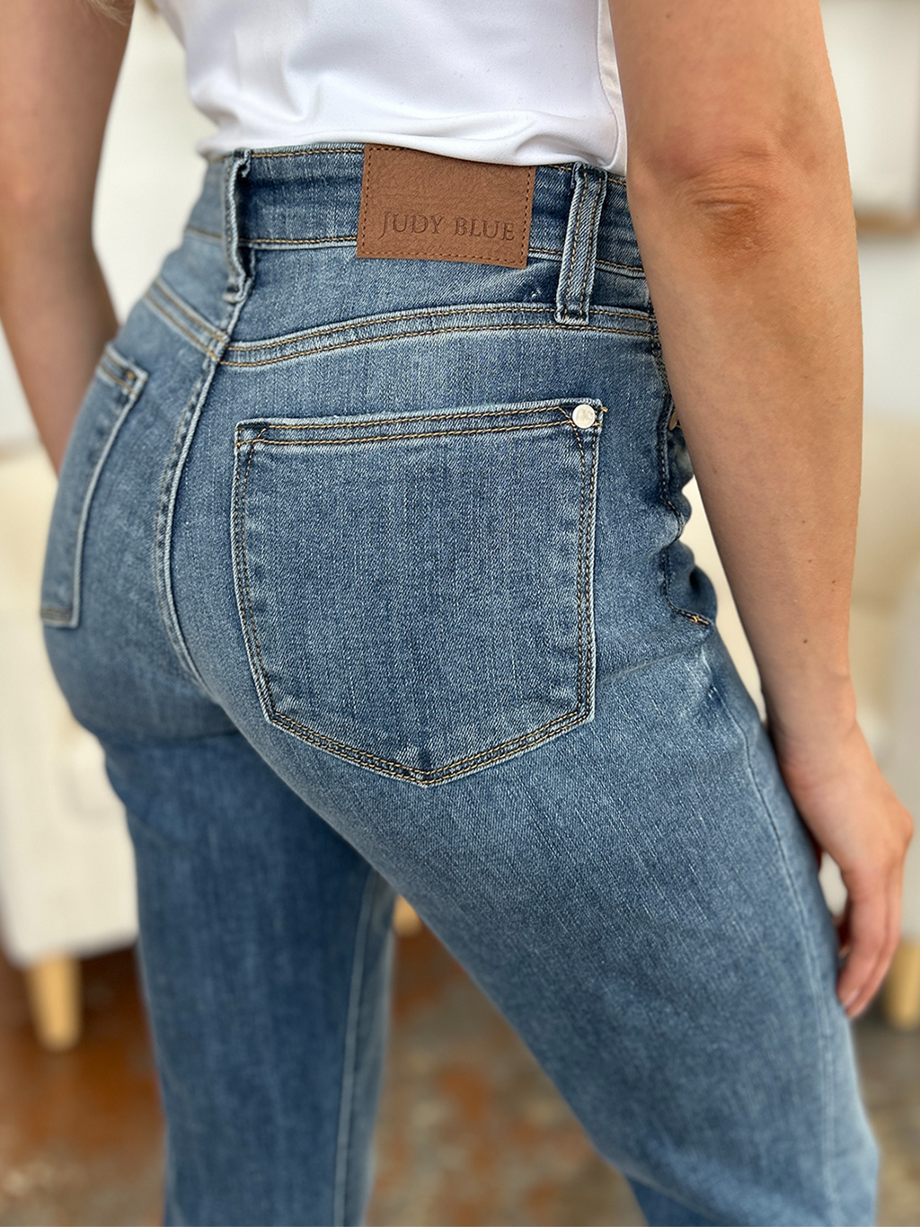 Judy Blue leather logo patch on waistband, medium blue cuffed hem slim jeans