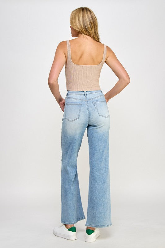 Light blue high-rise relaxed wide-leg jeans from back view, five-pocket design