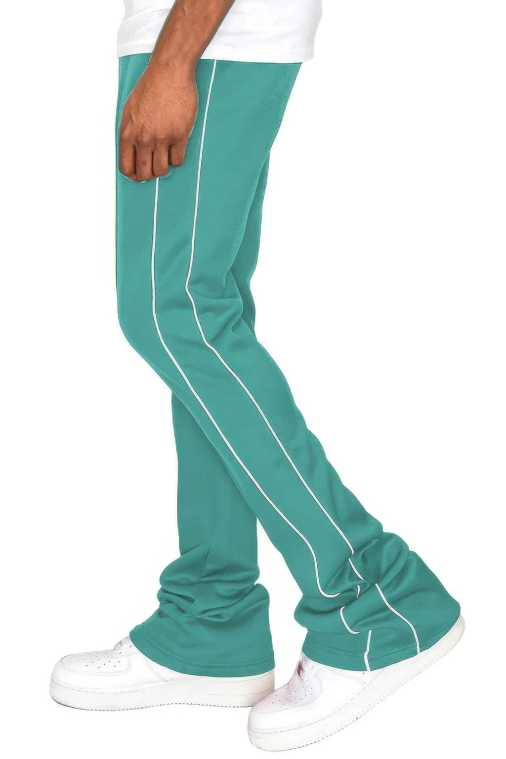 Teal pants showing side piping lines down the leg and stacked cuff
