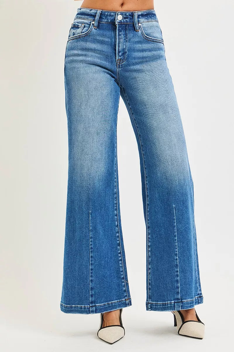 Blue mid-rise wide flared jeans, back view showing full flare leg