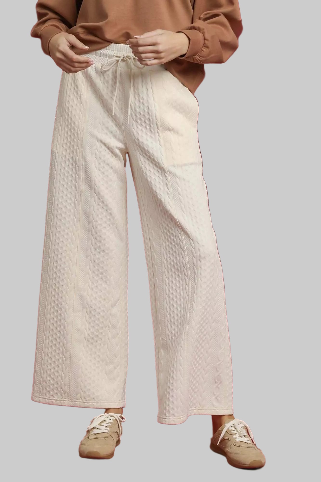 ECRU cable knit wide-leg pants with front drawstring ties and textured fabric