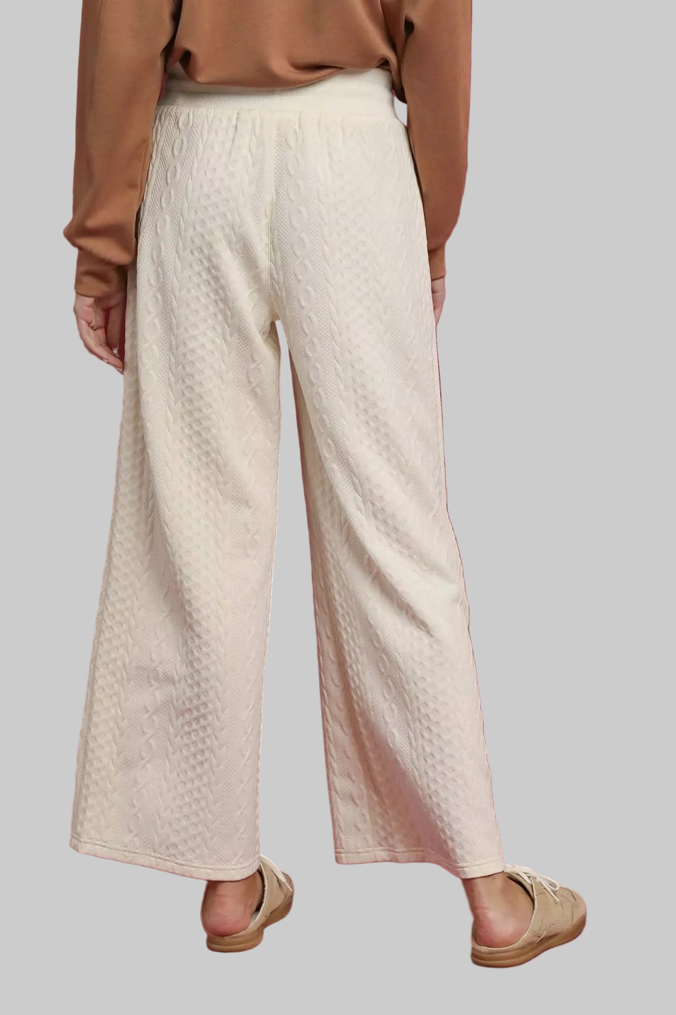 ECRU textured cable knit wide-leg pants with relaxed, flowy silhouette