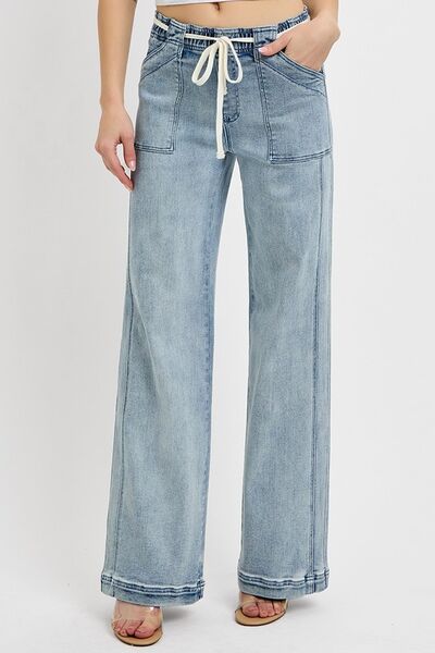 Medium-wash straight-leg jeans with drawstring waist and front patch pockets
