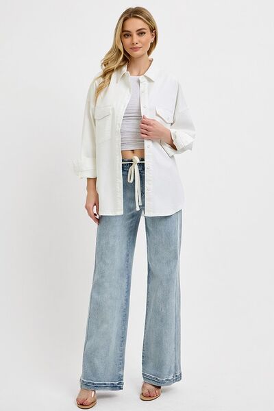 Medium-wash straight-leg jeans, front pockets, drawstring waist