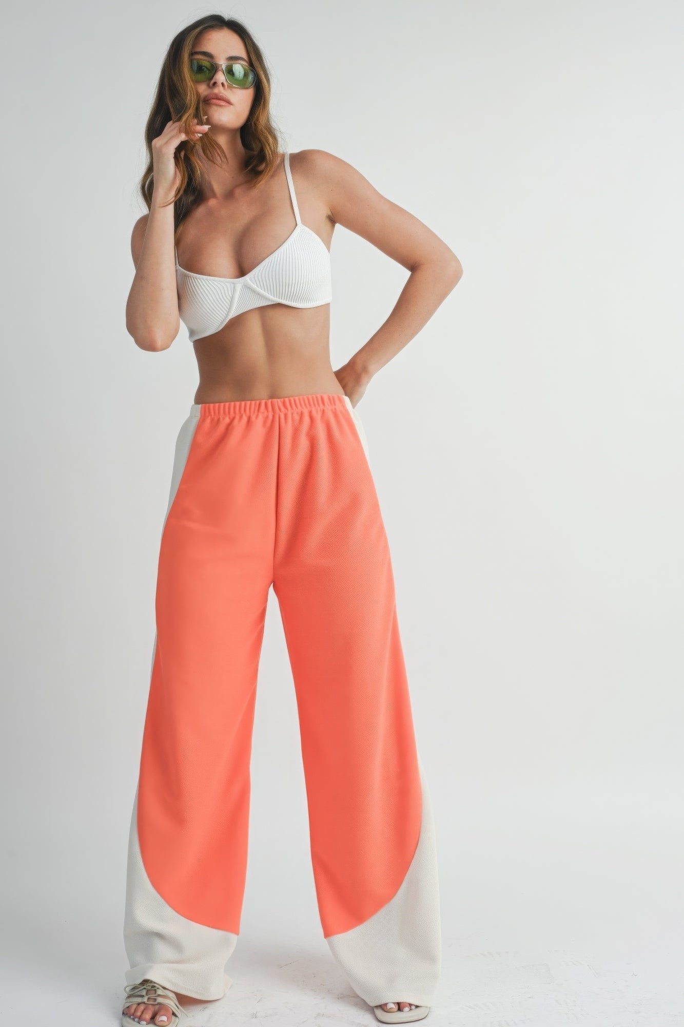 Two-Toned wide-leg pants: coral main with light contrasting lower panels, elastic waist.