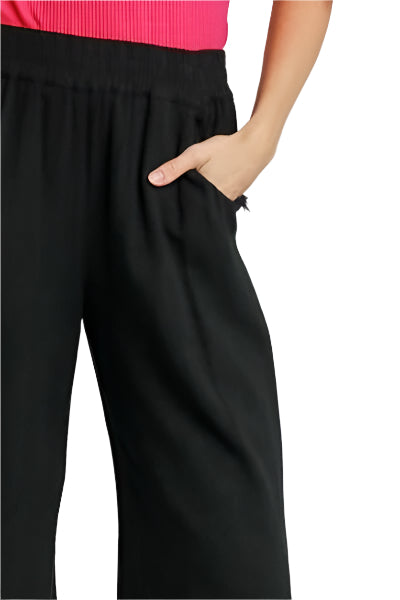 Black elastic-waist wide-leg pants, side view with gathered waistband