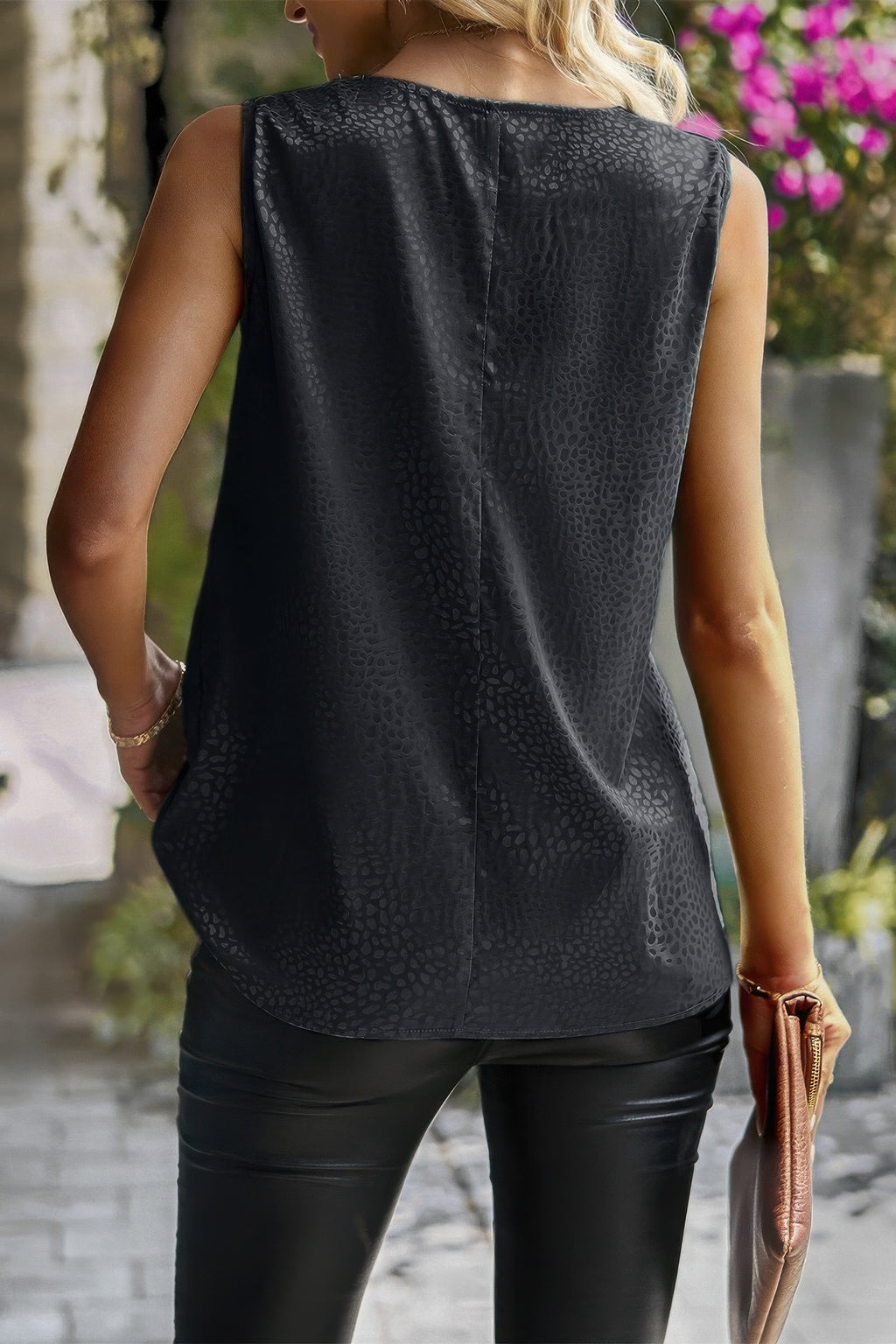 Back view: sleeveless scarf-collar snake-print top, black