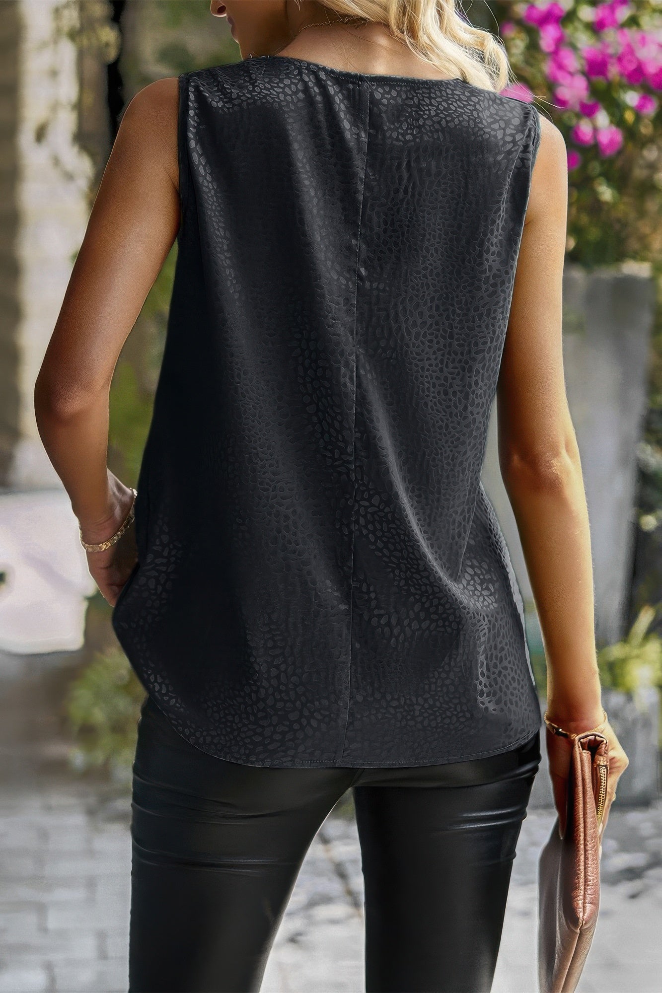 Back view: sleeveless scarf-collar snake-print top, black